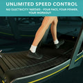 Person using a curved treadmill with text about unlimited speed control and no electricity needed.
