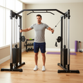 Man performing cable chest fly exercise on a functional trainer cable crossover machine in a modern home gym
