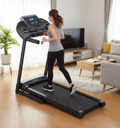 Pulserig Folding Treadmill – Compact Home Running Machine  woman using in living room