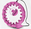 Purple smart hoop fitness equipment with adjustable design and weighted ball.