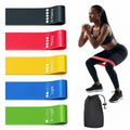 Pulserig resistance bands set with woman demonstrating squat exercise using red band.