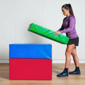 Female athlete using green plyometric box for home fitness training and jump exercises